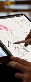Someone illustrating on Tablet